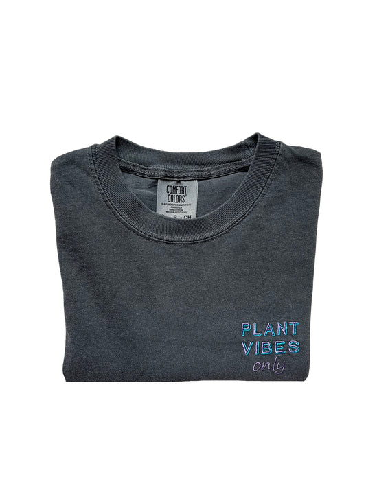grey t-shirt with purple and blue color embroidery text saying plant vibes only